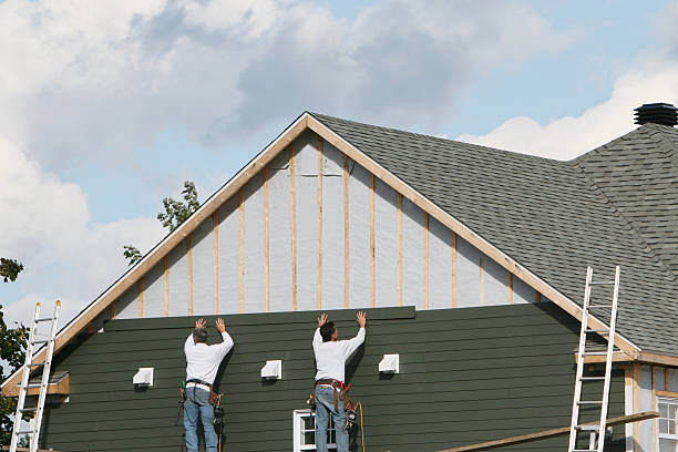 Professional Vinyl Siding technician working in Woodleaf, NC